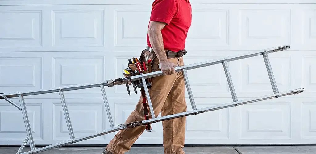 Garage door repair technician arriving with tools and ladder in West Palm Beach, FL