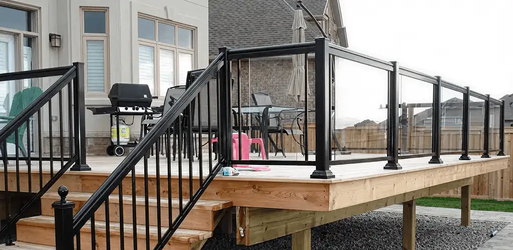 Handrail installation on a deck staircase for safety and code compliance in West Palm Beach, FL